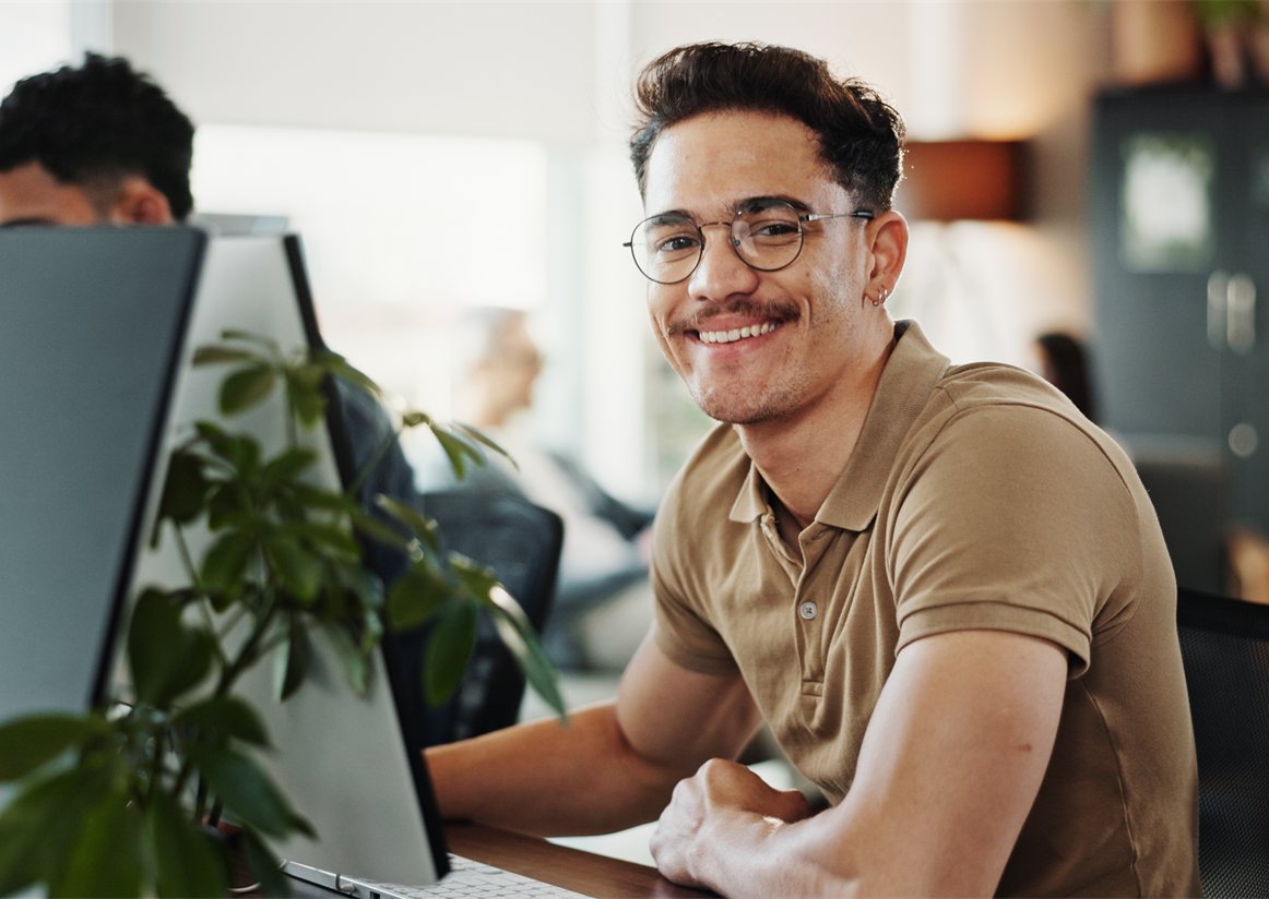 Design instructor at a desk
